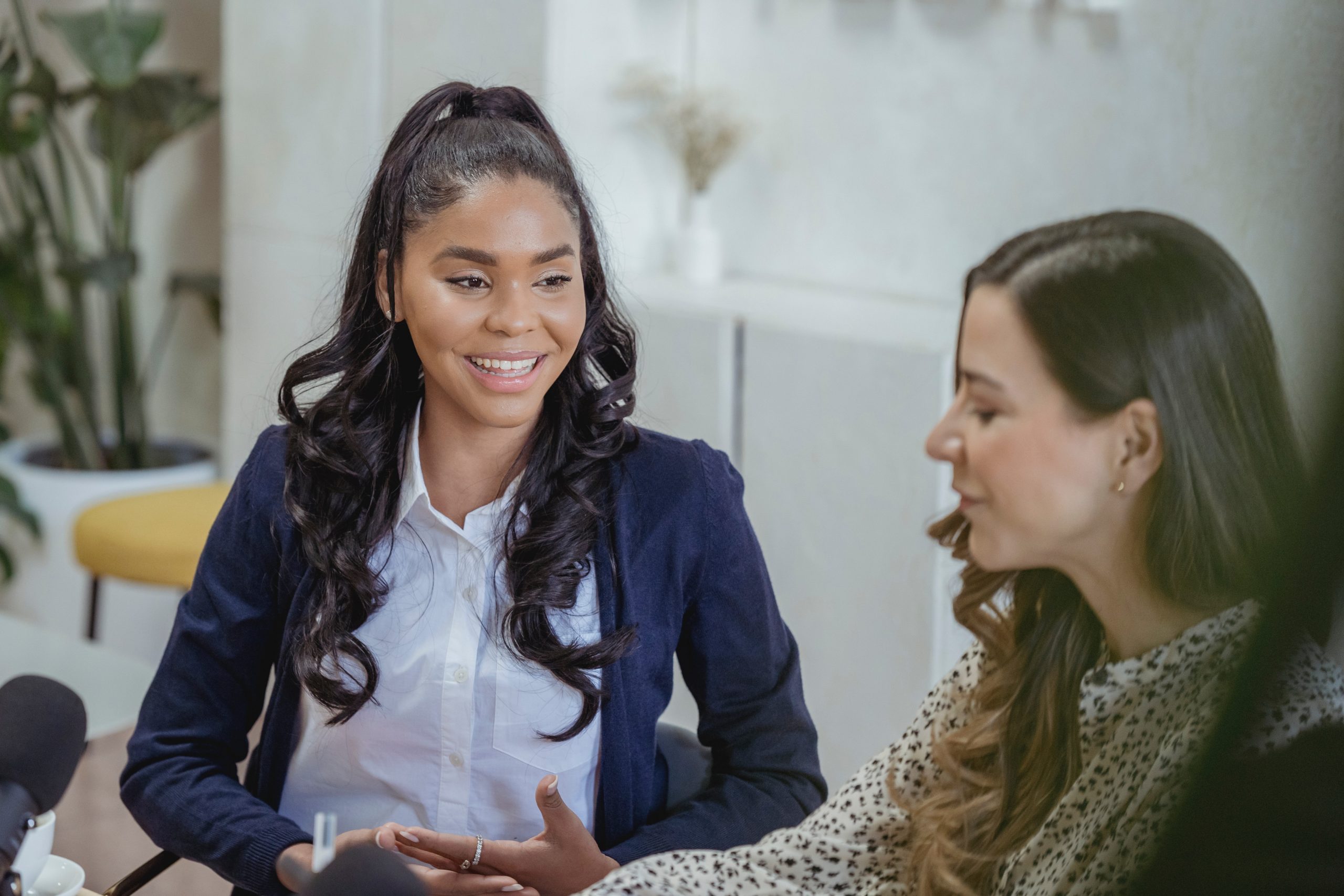 pexels-george-milton-6953855 Two smiling women in a meeting